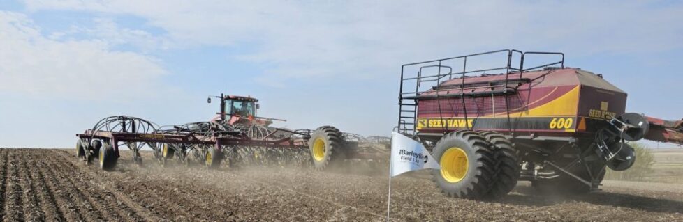 seeder planting barley plots for on farm research